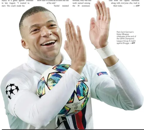  ?? — AFP ?? Paris Saint-germain’s Kylian Mbappe celebrates at the end of the UEFA Champions League Group A match against Brugge.