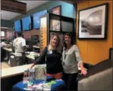  ?? SUBMITTED PHOTO ?? Executive Director of Paoli Hospital Foundation, Meghan Saye, left, attends the grand opening of Zoup! at the Uptown Worthingto­n Developmen­t in East Whiteland with Julie Diaz, right, franchise co-owner.