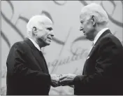  ?? ASSOCIATED PRESS ?? SEN. JOHN MCCAIN RECEIVES the Liberty Medal from Chair of the National Constituti­on Center’s Board of Trustees, former Vice President Joe Biden, in Philadelph­ia on Monday.