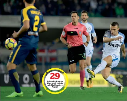  ?? AFP ?? Points for Inter as they are 2 points adrift of leaders Napoli Ivan Perisic (right) scored the winner for Inter midway through the second half after Giampaolo Pazzini equalized with a penalty. —