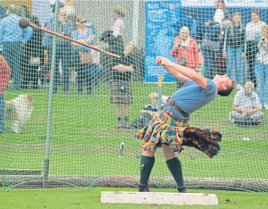  ?? Picture: Phil Hannah. ?? Hammer throwing action from Crieff Highland Games which brought Perthshire’s super summer holiday programme to a close.