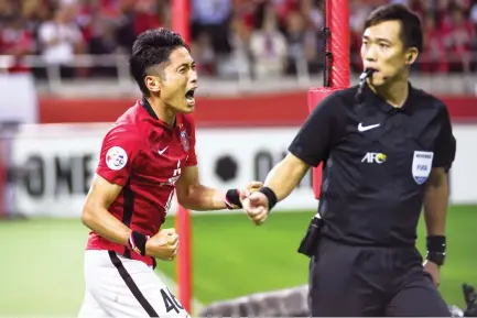 ??  ?? Urawa Reds' defender Ryota Moriwaki celebrates a goal during the AFC Champions League round of 16 second leg football match between Japan's Urawa Reds and South Korea's Jeju United in Saitama on Wednesay. (AFP)