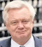  ??  ?? > Brexit Secretary David Davis leaving Downing Street yesterday