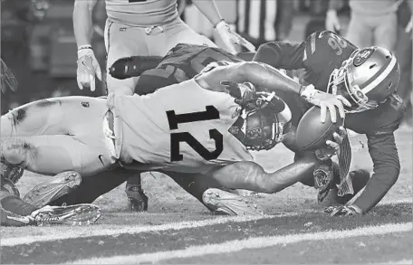  ?? Photograph­s by Wally Skalij Los Angeles Times ?? RAMS RECEIVER Sammy Watkins scores a touchdown in front of 49ers defensive back Lorenzo Jerome. Watkins scored twice.