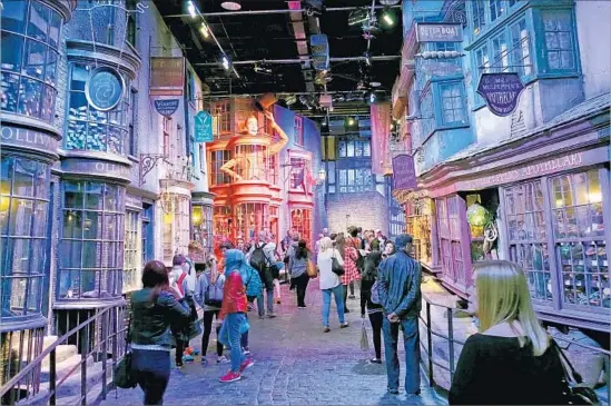  ?? Ross D. Franklin Associated Press ?? “HARRY POTTER” Warner Bros. Studio Tour just outside London magically transports visitors to the Diagon Alley movie set, above, as well as other sights familiar to Harry Potter fans.