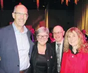  ??  ?? From left, Sundial Growers president Geoff Thompson, U of C provost Dru Marshall, Dinos Football alumni Jack Neumann and Cheryl Dulaba.