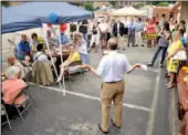  ??  ?? Scottie Mayfield addresses supporters at the grand opening Thursday of his campaign headquarte­rs on Park Street in Athens, Tenn.