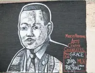  ?? MARCUS PERFORMING ARTS CENTER ?? Grace Collins’ mural of Martin Luther King Jr. was installed in November on the north side of the King Hall building, 3413 N. King Drive, in the Harambee neighborho­od. Collins is a student at Reagan High School. She won a contest sponsored by the Marcus Performing Arts Center.