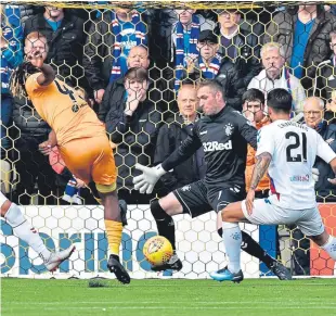  ?? Picture: SNS Group. ?? Dolly Menga fires past Allan McGregor.