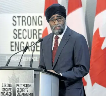  ?? ADRIAN WYLD/THE CANADIAN PRESS ?? Defence Minister Harjit Sajjan unveils the Liberal government’s long-awaited vision for expanding the Canadian Armed Forces in Ottawa on Wednesday. Canada will increase defence spending by $13.9 billion over the next decade.