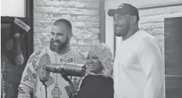  ?? PROVIDED BY MIXTAPE MEDIA/9.14 PICTURES ?? Legendary Philly songstress Patti LaBelle hangs out with Eagles players Jason Kelce, left, and Jordan Mailata. LaBelle is featured on the players’ album “A Philly Special Christmas Special.”