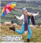  ?? ?? BROLLY GOOD FUN: Ashlea Cox on the Blackstair­s Mountains