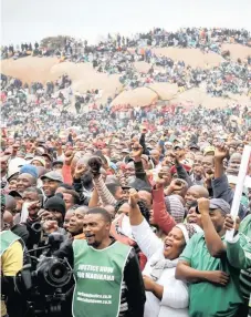  ??  ?? MINING interests under the microscope. In this file photo, South Africans commemorat­e the 2012 Marikana massacre where 34 miners were killed over a wage dispute.