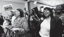  ?? Marie D. De Jesús / Staff photograph­er ?? Sylvia Garcia’s supporters cheer for her in Houston after her victory as U.S. representa­tive for the 29th District of Texas.