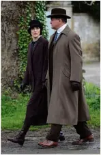  ??  ?? Michelle Dockery and Hugh Bonneville in filming for Downton