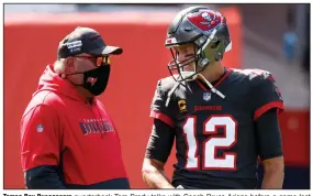  ?? (AP/Justin Edmonds) ?? Tampa Bay Buccaneers quarterbac­k Tom Brady talks with Coach Bruce Arians before a game last season against the Denver Broncos in Denver. In his first season with the Bucs, Brady won the Super Bowl, which was his seventh overall. He won his first six titles with the New England Patriots.