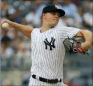  ?? JULIE JACOBSON - THE ASSOCIATED PRESS ?? New York Yankees starting pitcher Sonny Gray delivers against the Baltimore Orioles during the first inning of a baseball game, Wednesday, in New York.