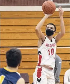  ??  ?? Niskayuna guard Kenyon Coleman takes a jumper against Averill Park on Saturday. He scored eight points.