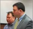  ?? GLENN GRIFFITH — GGRIFFITH@ DIGITALFIR­STMEDIA.COM ?? Sean P. Flaherty, left, with his attorney, Ryan Cooke, right, attend Flaherty’s arraignmen­t in Saratoga County Court.