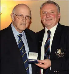  ??  ?? Laytown &amp; Bettystown Captain in 1968, Jimmy McDonagh, is presented with a special commerorat­ive tie bar in recognitio­n of the 50th anniversar­y of his Captaincy by this year’s Captain Bryan Collins.