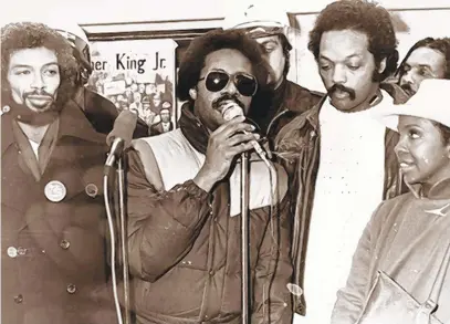  ?? AFRO AMERICAN NEWSPAPERS ?? Gil Scott-Heron, from left, Stevie Wonder, Jesse Jackson, and Gladys Knight at a news conference on Jan. 15, 1982, in Washington, D.C.