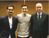  ??  ?? controvers­y... recep tayyip erdogan (right) with ilkay Gundogan (left) and Mesut Ozil