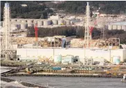  ?? AFP ?? Fotografía aérea tomada muestra la planta de energía nuclear No. 1 de Fukushima, se observan los daños.