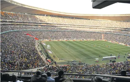  ?? /Gallo Images ?? Orlando Pirates and Kaizer Chiefs during their Carling Black Label Cup match in 2019. As supporters return to stadiums, it must be remembered that strict Covid-19 restrictio­ns apply.