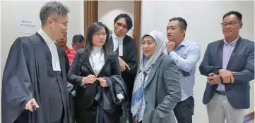  ??  ?? Noor Hayaty (third right) with her counsels (from left) Chung, Melanie and Mohammed Fareez after the decision yesterday.