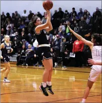  ??  ?? Ella Burger of Dakota takes a shot during a 2020 Division 1 regional semifinal against Ford. Regionals were cut short in March by the coronaviru­s pandemic.