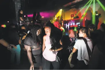  ?? Photos by Noah Berger / Special to The Chronicle ?? Above: Allie Arnold dances at Hue Lounge and Nightclub in San Francisco. Below: Bennett Montoya, the owner of the North Beach club, says it is being targeted because its clientele is primarily black.