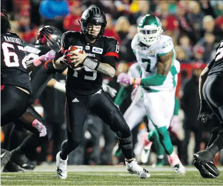  ?? JEFF MCINTOSH/THE CANADIAN PRESS ?? Quarterbac­k Bo Levi Mitchell says the Stampeders don’t belong at the top of the CFL power rankings heading into Friday night’s pivotal tilt with the Winnipeg Blue Bombers. Bookies have the Stampeders listed as a 3.5 point underdogs.