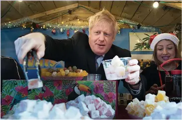  ??  ?? CHARISMA: The Prime Minister was chatting to onlookers in a Salisbury market this week