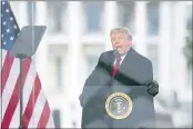  ?? EVAN VUCCI — THE ASSOCIATED PRESS FILE ?? Then-President Donald Trump speaks during a rally in Washington protesting the electoral college certificat­ion of Joe Biden as president.