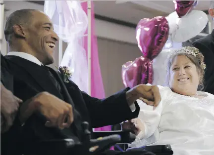  ?? ASHLEY FRASER/OTTAWA CITIZEN FILES ?? Ricky Brooks and Nadia Cashman, each using a wheelchair, got married at the Montgomery Legion on Kent Street on Sept. 5, 2009. They maintained that marriage even when they had to live in separate care facilities. Cashman died on Aug. 26.