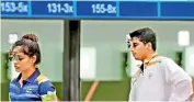  ?? —
PTI ?? Manu Bhaker (left) and Saurabh Chaudhary react during the 10m Air Pistol Mixed Team event on Tuesday.