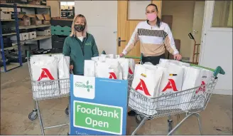  ??  ?? A-Plan Thatcham business developmen­t manager Carlie Norwell delivers the Easter eggs to the West Berks Foodbank