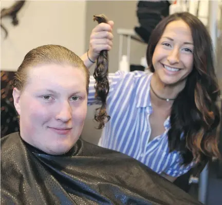  ?? MICHELLE BERG ?? Huskies offensive lineman Connor Berglof, who grew his locks to 16 inches over the last five years, let stylist Tanya Marcoux cut his hair Monday in the name of helping others. Berglof donated his locks to the Pantene Beautiful Lengths program, which...