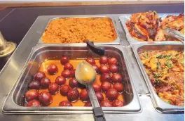  ?? ?? From bottom to top: Gulab Jamun (Indian milk doughnuts) and carrot pudding.