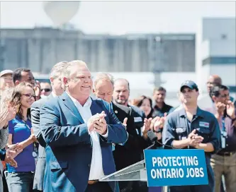  ?? NATHAN DENETTE THE CANADIAN PRESS ?? Ontario premier-designate Doug Ford announces his commitment to keeping the Pickering Nuclear Generating Station in operation until 2024 in Pickering, Thursday.