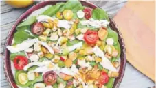  ?? The Associated Press ?? A green salad with roasted apple and pumpkin vinaigrett­e. Melissa D’Arabian,