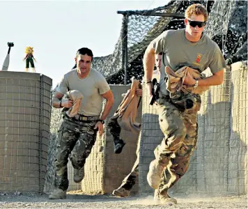  ??  ?? Fiercely competitiv­e: Prince Harry in Afghanista­n in 2012; below, at the Invictus Games in 2014; and inset, girlfriend Meghan Markle