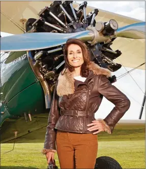  ??  ?? ‘DAMAGING’: Tracey Curtis-Taylor with her 1942 Boeing-Stearman biplane in 2015