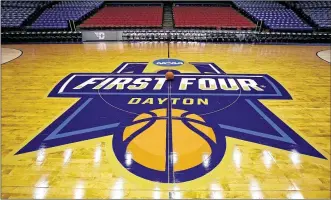  ?? TY GREENLEES / STAFF ?? The floor, backboards and hoops are ready for the NCAA First Four games at UD Arena. Team practices start on Monday. The first game is at 6:30 p.m. Tuesday.