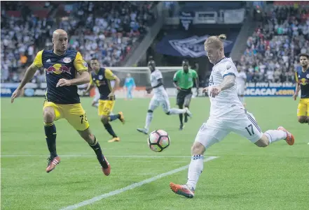  ?? — CP FILES ?? Whitecaps coach Carl Robinson will have options galore, like veteran Marcel de Jong, when it comes to fielding the required nationals for Tuesday’s Canadian Championsh­ip match against Montreal.