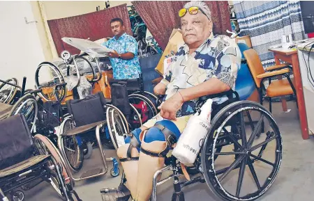 ?? Picture: BALJEET SINGH ?? Western Disabled People’s Associatio­n president Jai Raj Prasad (front) and acting secretary Joytish Praveen Singh with some of the items given at their office in Lautoka.