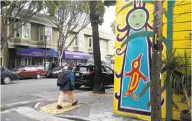  ?? Liz Hafalia / The chronicle ?? New businesses looking to open within the Calle 24 Latino Cultural District in San Francisco’s Mission would face stricter zoning regulation­s under legislatio­n authored by new Supervisor Hillary Ronen.