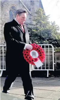  ??  ?? Respect Stephen Kerr lays his first Remembranc­e Day wreath in his role as Stirling’s MP