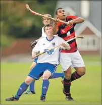  ?? Photograph: Neil Paterson. ?? Glasgow Mid Argyll’s Garry Luke with Eddie Tembo of Glenurquha­rt in action during their 2-2 draw at Drumnadroc­hit.