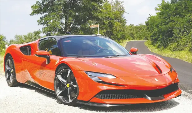  ?? PHOTOS: DAVID BOOTH / DRIVING.CA ?? The 2021 Ferrari SF90 Stradale is the legendary Italian automaker’s first plug-in hybrid that it offers 25 kilometres of emissions-free motoring.